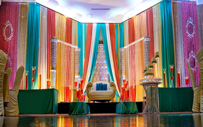 Indian wedding design that is given and vibrant, using bright colors, lovely highlights, and norms.