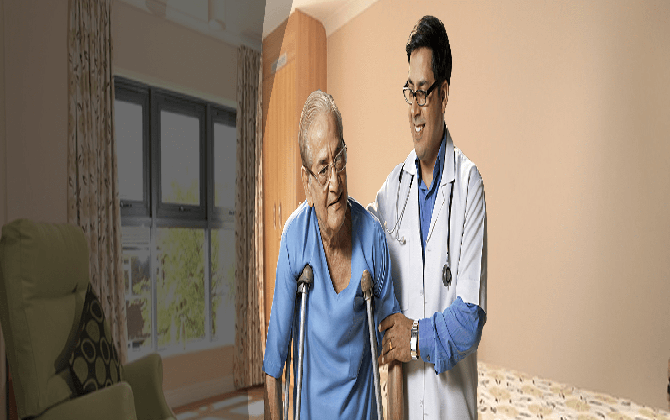 A home doctor gives support and care to a old citizen in a room by holding his hand with patiently