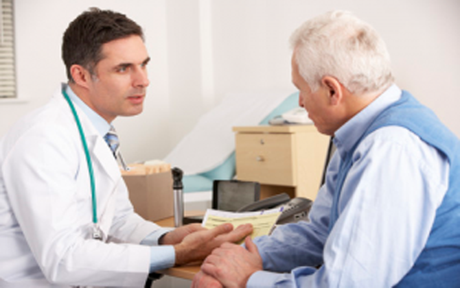 A doctor is takes carefully with an elderly guy, providing medical counsel, and caring for treatment