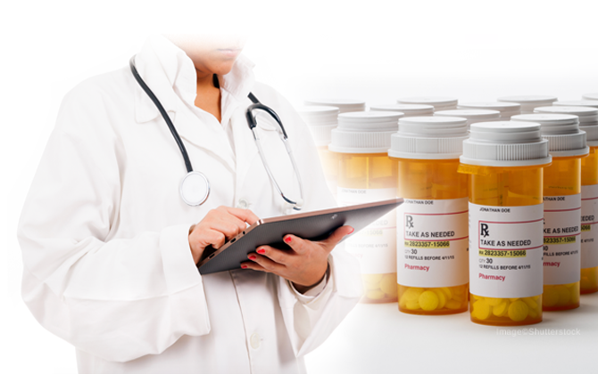 A female healthcare worker carrying tablets and pills for prescription medications at home